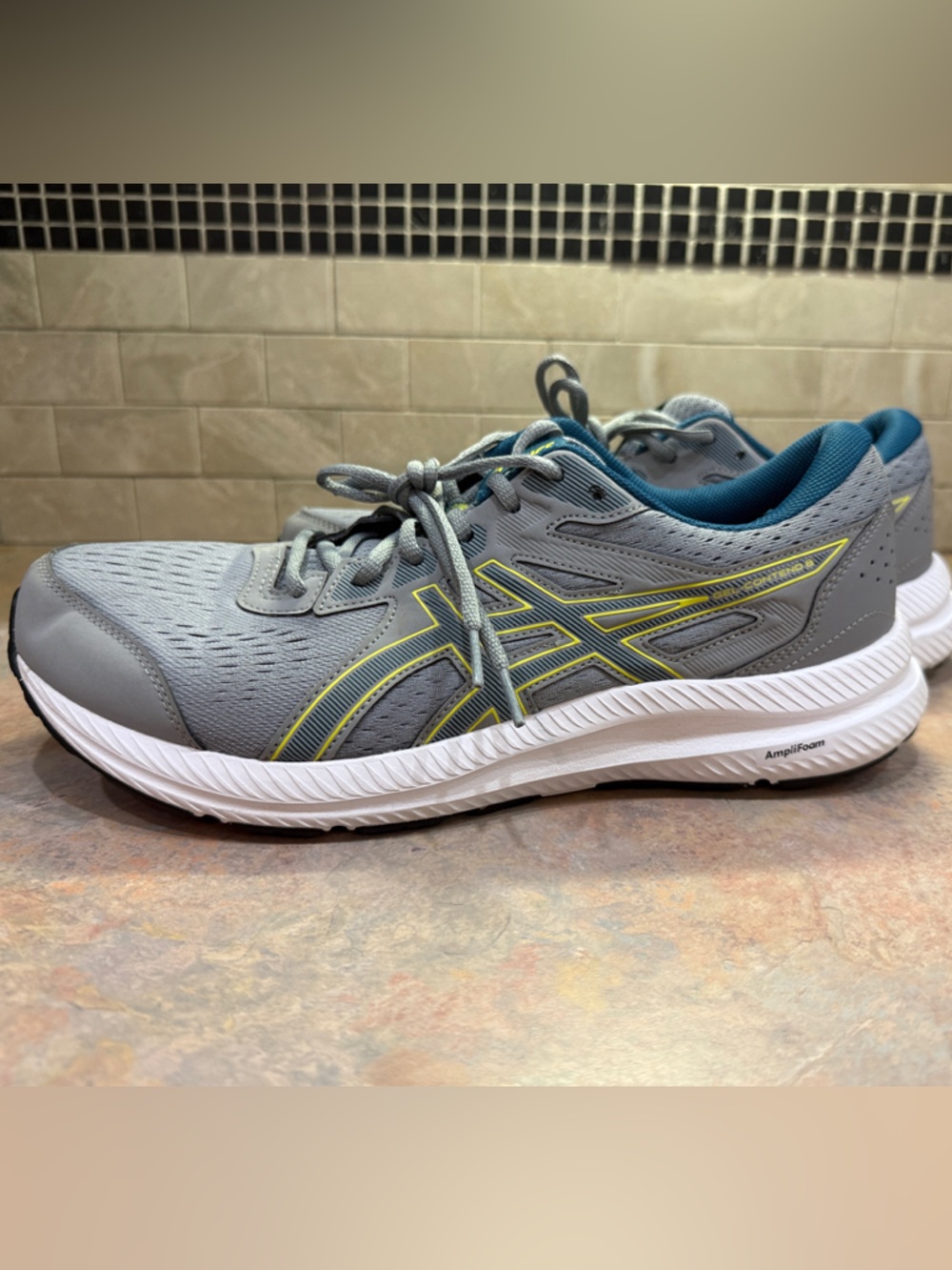 Asics Gray Running Shoe with Teal Lining and Yellow Trim